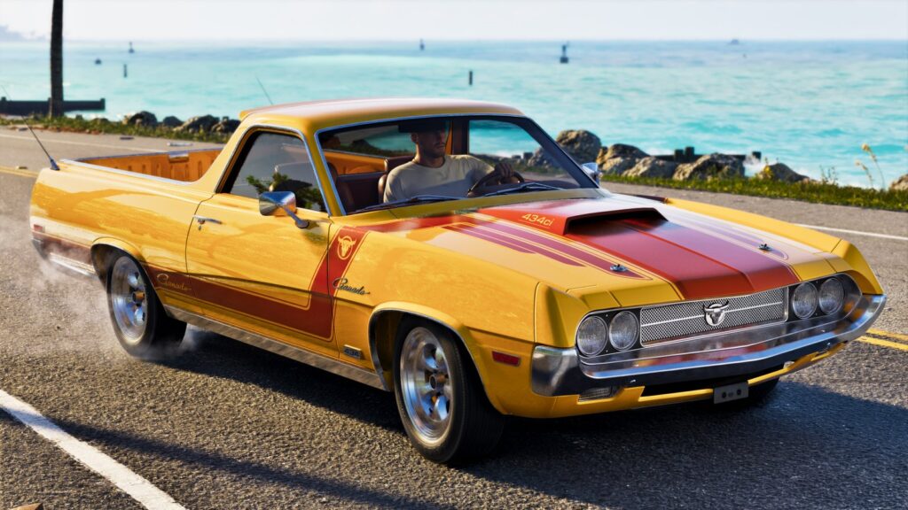 The Vapid Ganado Retro Build, a yellow pickup with red and white stripes, parked by the sea. Image: Rockstar Games.