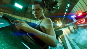 Lucia fires a pistol from a car window during a tunnel chase, police lights behind. Image: Rockstar Games.