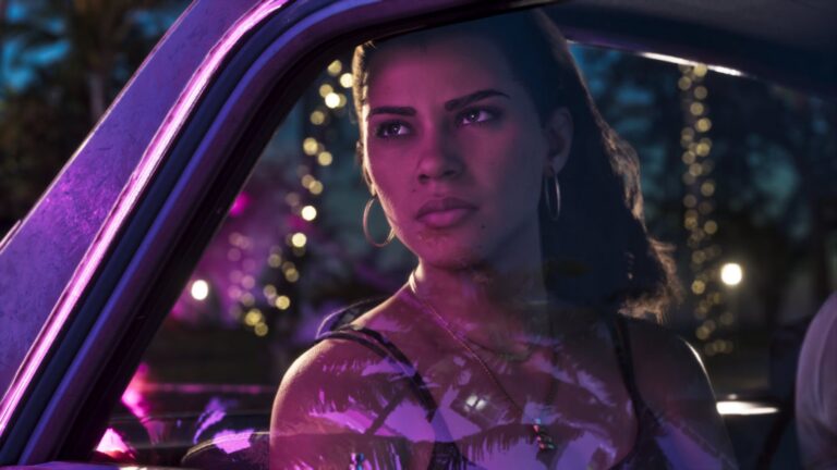 Lucia looks out of the window of a purple car at night. Image: Rockstar Games.