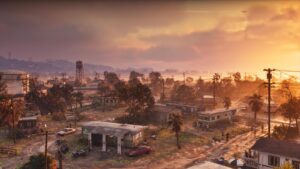 Port Gellhorn at sunset, a derelict strip mall and petrol station under a water tower. Image: Rockstar Games.